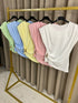 Elegant Padded Shoulder Slinky Top with Gold Detail